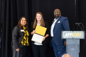 Caitlin Langley pictured with Jamie Parson and Lamont Sellers