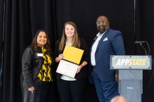 Caitlin Langley pictured with Jamie Parson and Lamont Sellers 