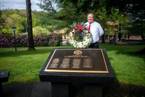 Appalachian State University’s director of App Catering, Chuck Ford, places a wreath at Appalachian’s Veterans Memorial to commemorate Memorial Day 2020. He was selected for the honor by Appalachian Chancellor Sheri Everts. Photo by Marie Freeman