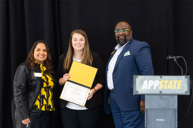 Caitlin Langley pictured with Jamie Parson and Lamont Sellers 